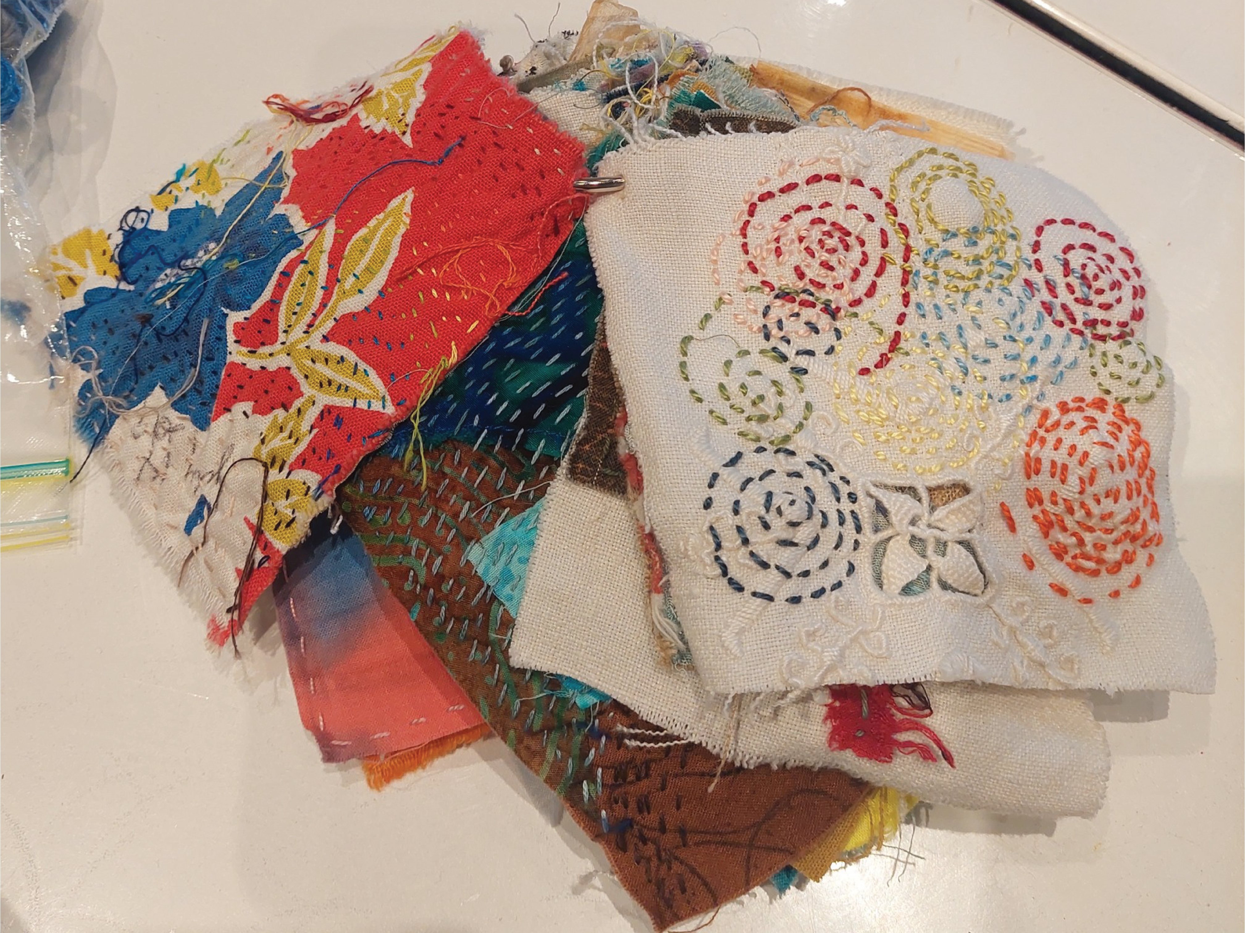 scrap fabric with intentional stitched designs
